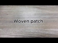 Il ricamo su ordinazione all'ingrosso rattoppa il ferro sulle toppe tessute per abbigliamento