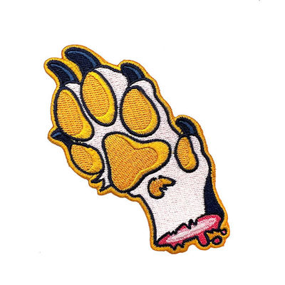 Il cane sveglio Paw Iron On Clothing Patch del cartone 100% ha ricamato segue i colori di PMS