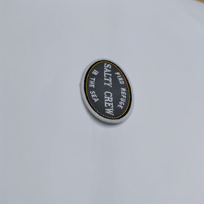 Toppa lavabile dell'abbigliamento del confine su ordinazione di Logo Embroidered Iron On Patches Merrow