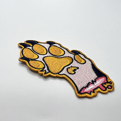 Il cane sveglio Paw Iron On Clothing Patch del cartone 100% ha ricamato segue i colori di PMS