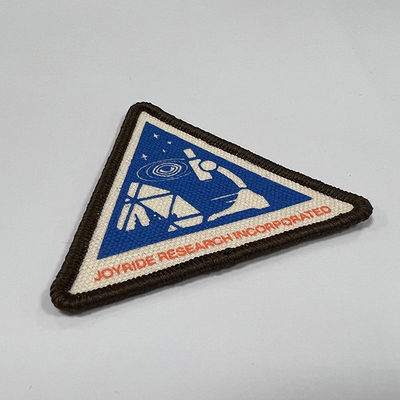 Il ricamo d'avvertimento sperimentale delle toppe del triangolo rattoppa il ferro sul confine di Merrowed