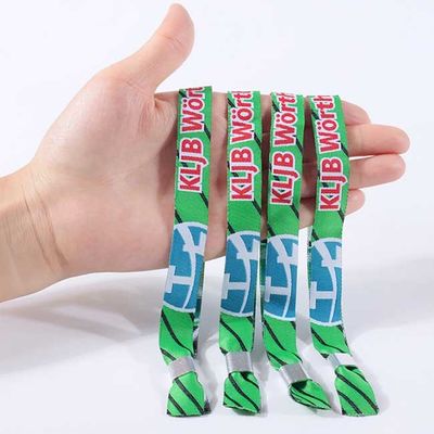 Bande di polso tessute alla moda dell'OEM Logo Textile Wristband su ordinazione