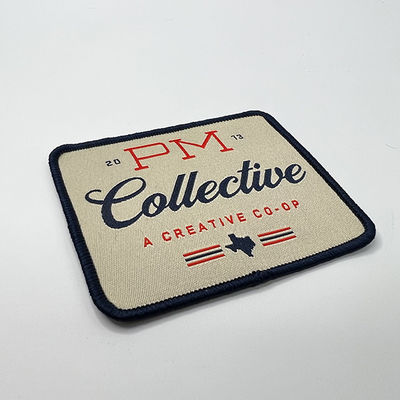 Logo Iron On Woven Patch che su ordinazione Emroidery lavabile rattoppa il laser ha tagliato il confine per abbigliamento