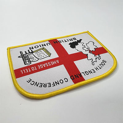Ferro su ordinazione della mappa del cartone dell'OEM su forma su ordinazione tessuta del confine fatto a mano delle toppe per abbigliamento
